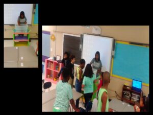 Teacher leading classroom activity with students engaged.
