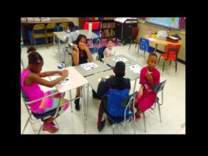 Kids playing educational game in classroom.
