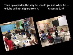 Children in classroom eating lunch, with Proverbs 22:6.